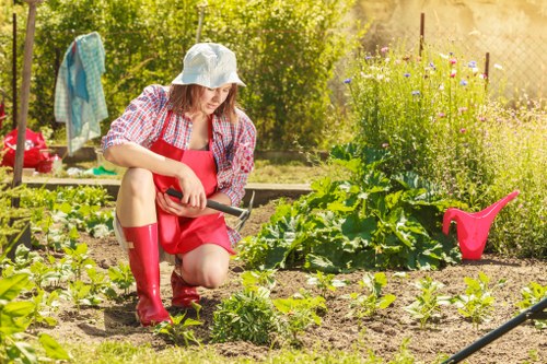 Professional landscaper working on garden design in Leytonstone